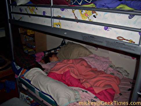 Lila sleeps by herself in the bunk bed